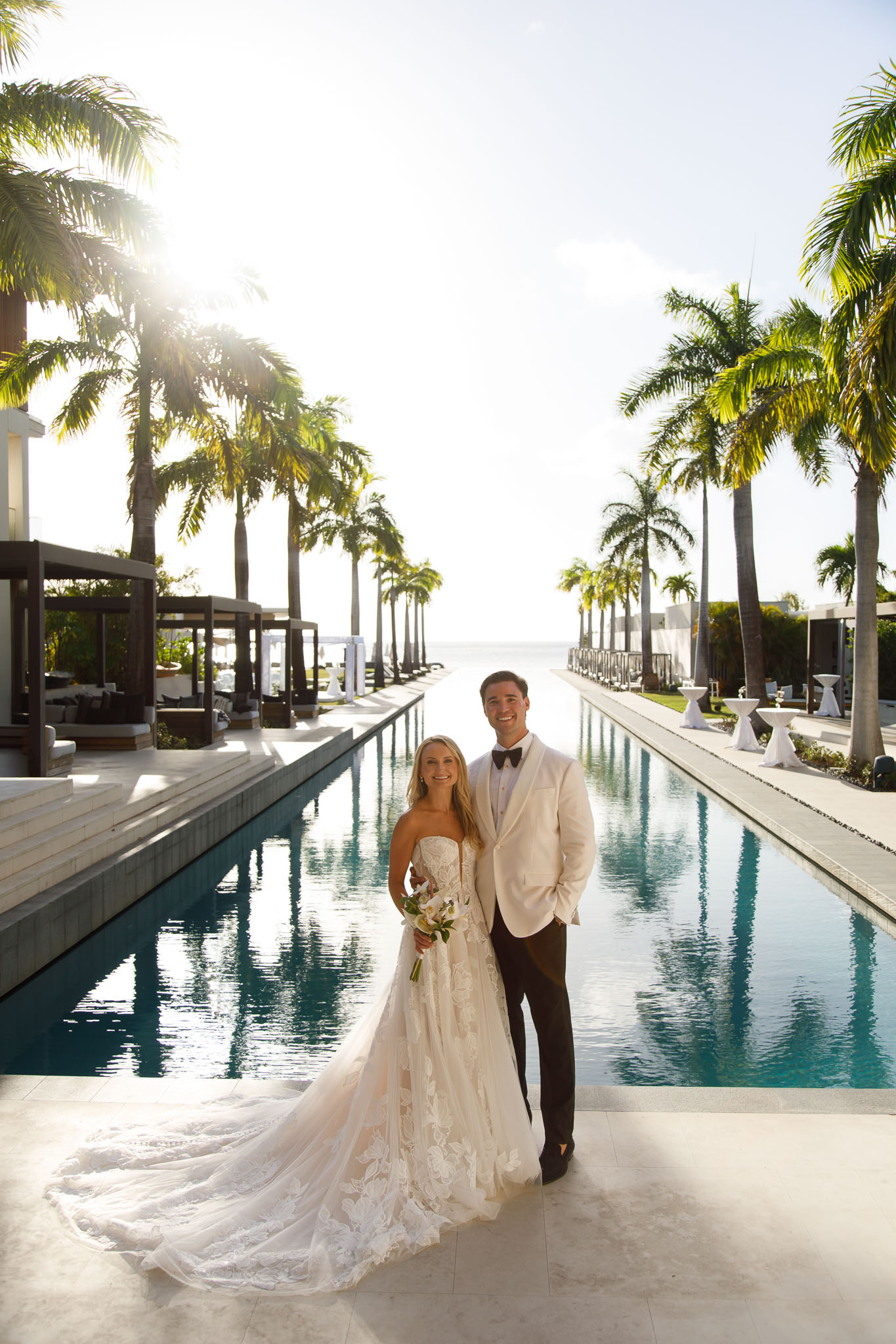 Married Couple posing for a portrait photo after their wedding