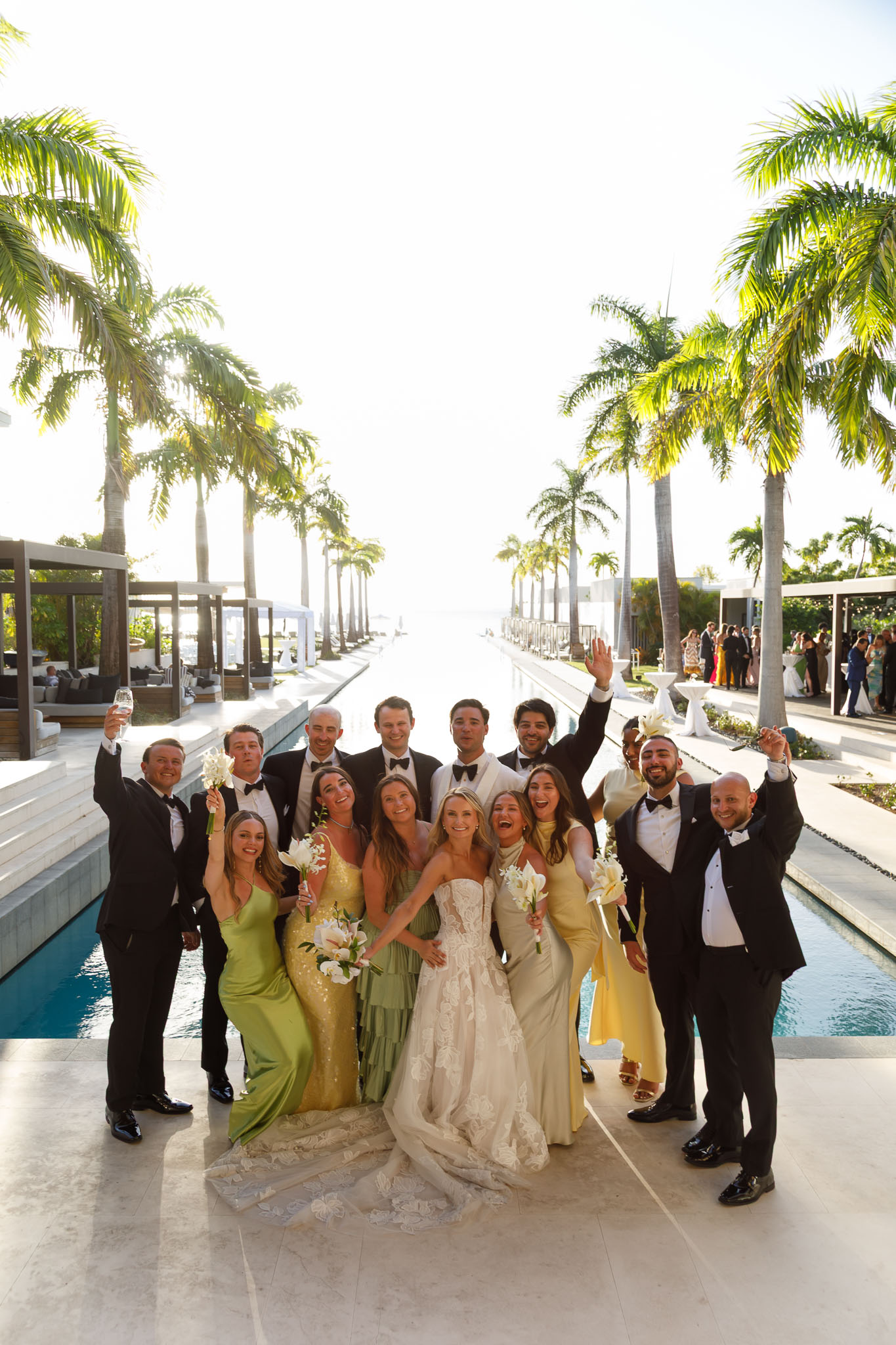 Wedding party group celebrating recent marriage ceremony